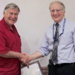 Dick Doviak receiving an award from NSSL Director Steve Koch.